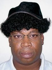 Captured drugs baron Dudus Coke wearing a wig