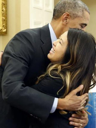 President Obama hugs Ebola Virus Disease survivor at the White House