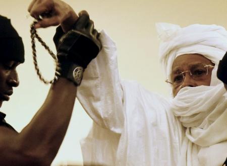 Prison and security guards had to take Habre to court by force after he refused to do so willingly claiming the court had no legal basis to try him.