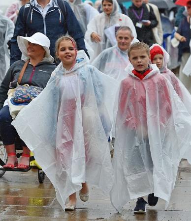 The rain could not stop these revellers.
