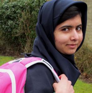 Malala Yousafzai carrying her popo bag at her first day at school after a successful surgery. She was shot by the Taliban for advocating for the rights of girls to education in Pakistan.