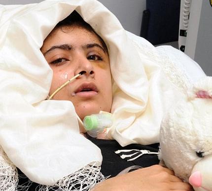 Malala receiving urgent medical attention in Britain after she was shot in the head by the Taliban in Pakistan.