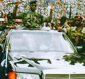 New Head of State Captain Valentine Strasser rides in triumph after successful April 29, 1992 coup.